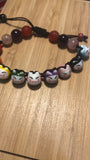 Braccialetto di maneki neko,bracelet of lucky cats Japanese, gatto portafortuna Giappone.